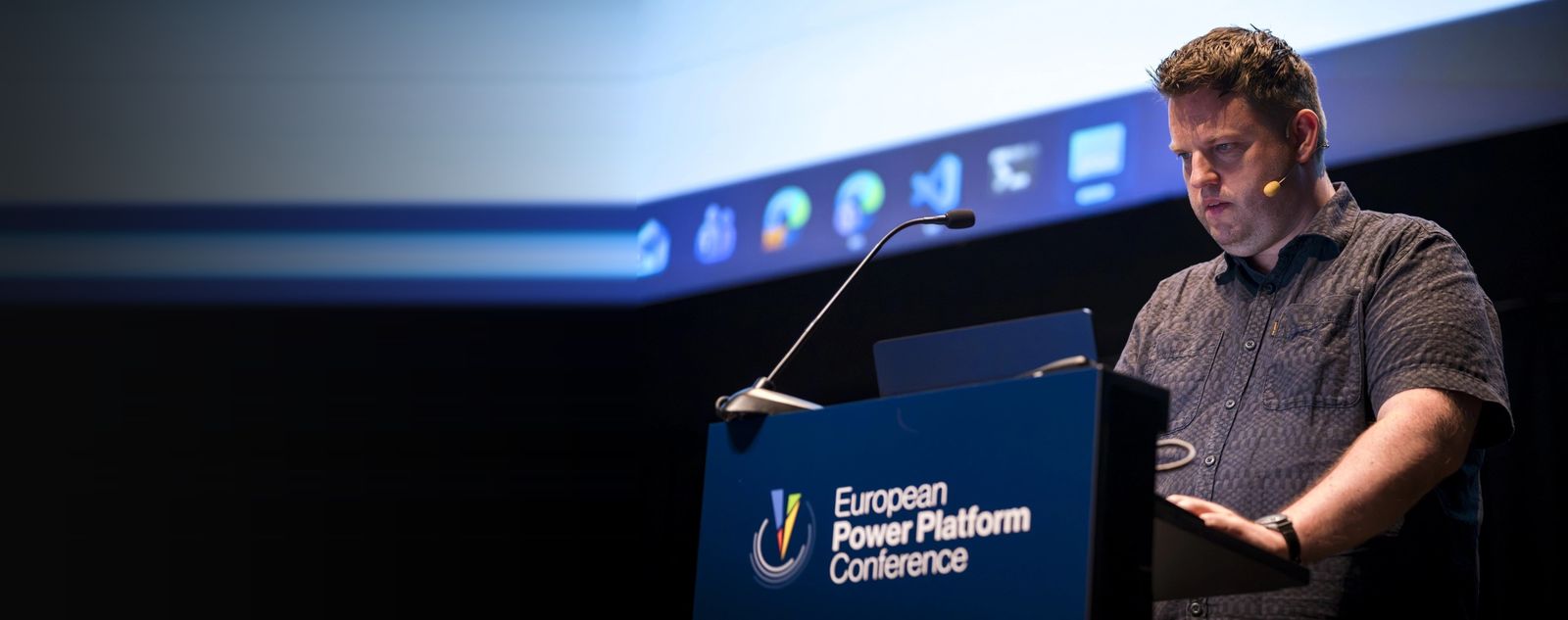 Daniel Laskewitz speaking from the lectern at the European Power Platform Conference 2026.